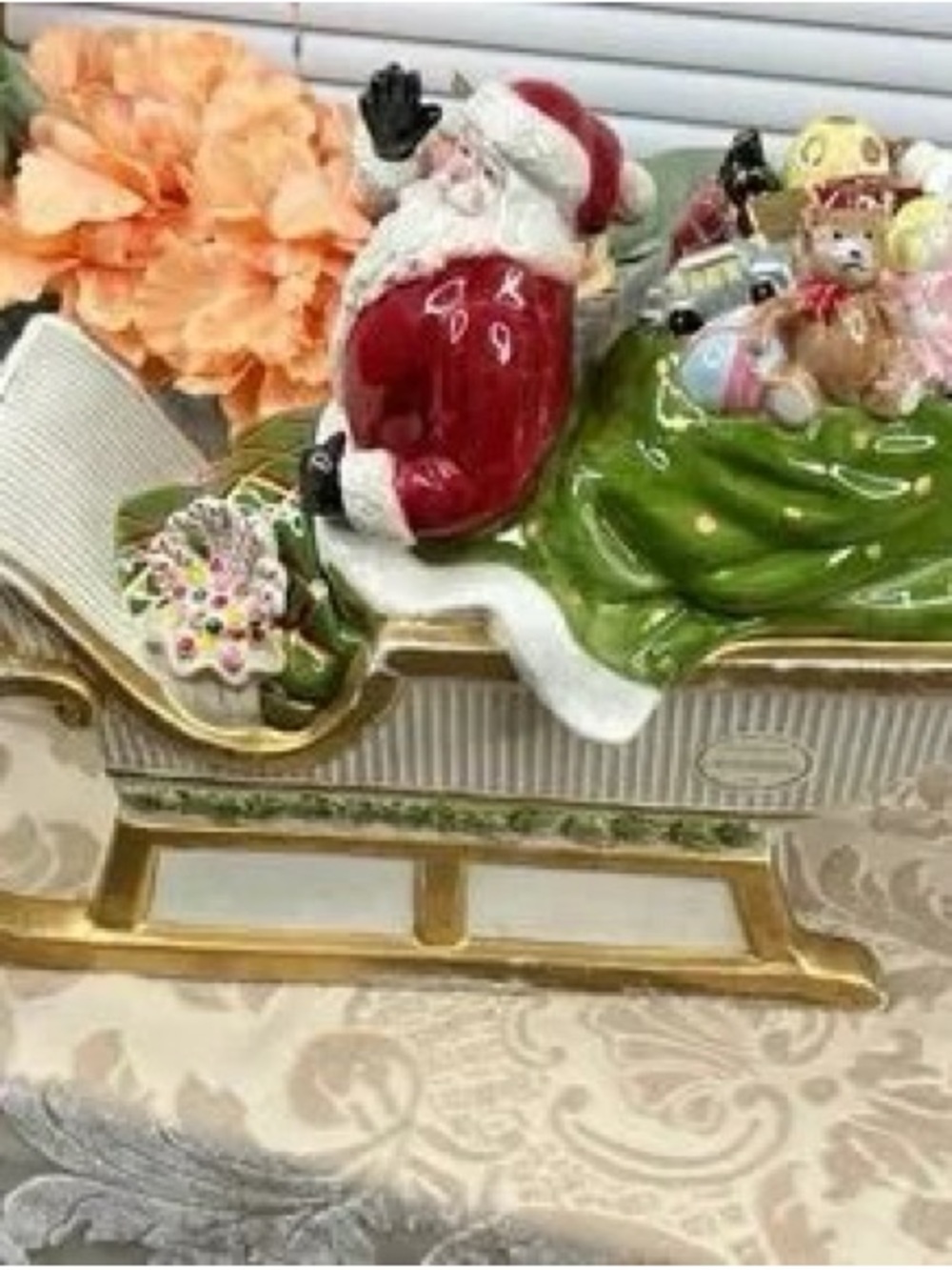 Festive Ceramic Santa Sleigh Figurine in Red & Green